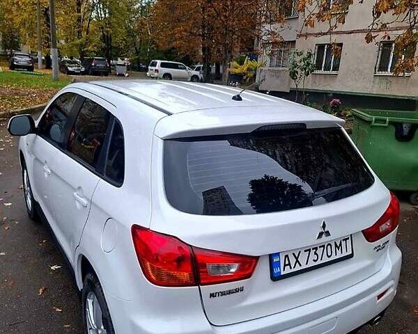 Белый Мицубиси АСХ, объемом двигателя 2 л и пробегом 115 тыс. км за 9800 $, фото 2 на Automoto.ua