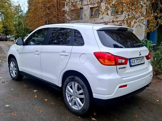 Белый Мицубиси АСХ, объемом двигателя 2 л и пробегом 115 тыс. км за 9800 $, фото 7 на Automoto.ua