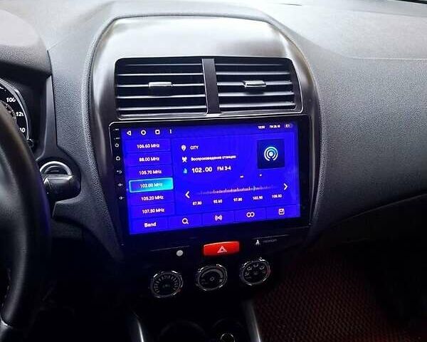 Белый Мицубиси АСХ, объемом двигателя 2 л и пробегом 115 тыс. км за 9800 $, фото 1 на Automoto.ua