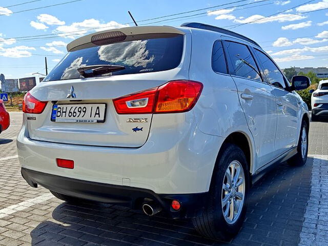 Белый Мицубиси АСХ, объемом двигателя 2 л и пробегом 124 тыс. км за 11500 $, фото 1 на Automoto.ua