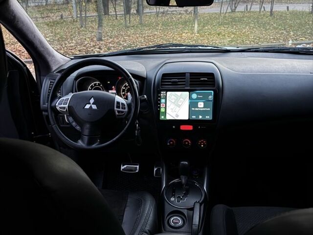 Белый Мицубиси АСХ, объемом двигателя 2 л и пробегом 249 тыс. км за 9200 $, фото 9 на Automoto.ua