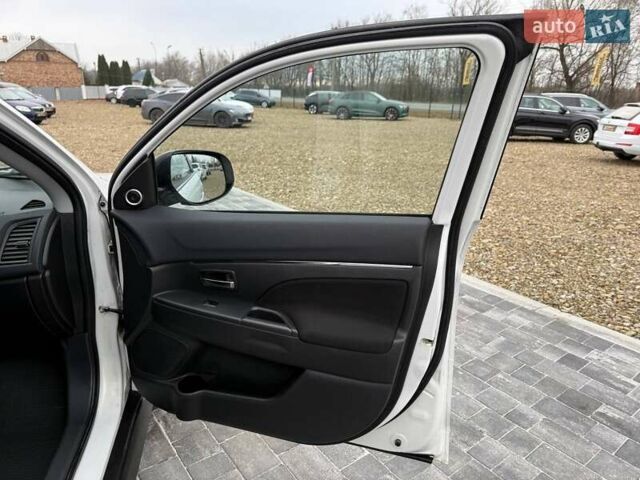 Белый Мицубиси АСХ, объемом двигателя 1.8 л и пробегом 205 тыс. км за 11599 $, фото 20 на Automoto.ua