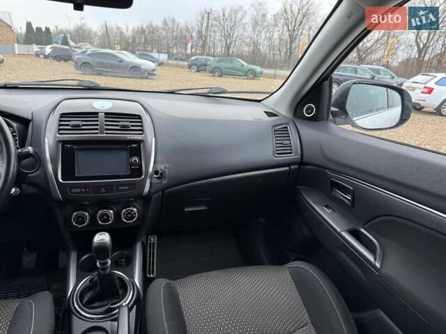 Белый Мицубиси АСХ, объемом двигателя 1.8 л и пробегом 205 тыс. км за 11599 $, фото 19 на Automoto.ua