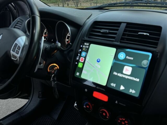 Белый Мицубиси АСХ, объемом двигателя 2 л и пробегом 249 тыс. км за 9200 $, фото 8 на Automoto.ua