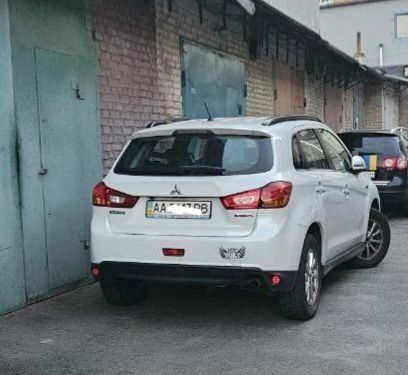 Белый Мицубиси АСХ, объемом двигателя 1.8 л и пробегом 166 тыс. км за 8500 $, фото 1 на Automoto.ua