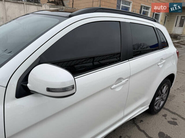 Белый Мицубиси АСХ, объемом двигателя 2.27 л и пробегом 152 тыс. км за 14500 $, фото 6 на Automoto.ua