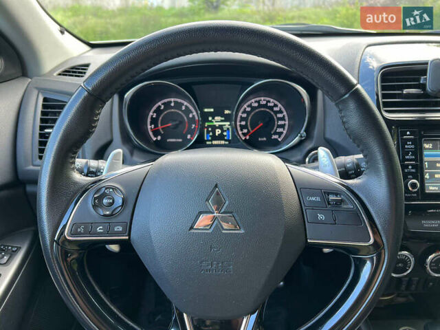 Белый Мицубиси АСХ, объемом двигателя 2 л и пробегом 85 тыс. км за 18000 $, фото 2 на Automoto.ua