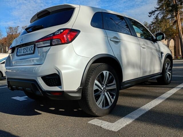 Белый Мицубиси АСХ, объемом двигателя 2 л и пробегом 90 тыс. км за 16500 $, фото 2 на Automoto.ua