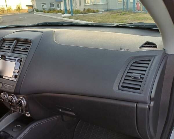 Белый Мицубиси АСХ, объемом двигателя 1.6 л и пробегом 61 тыс. км за 17300 $, фото 38 на Automoto.ua