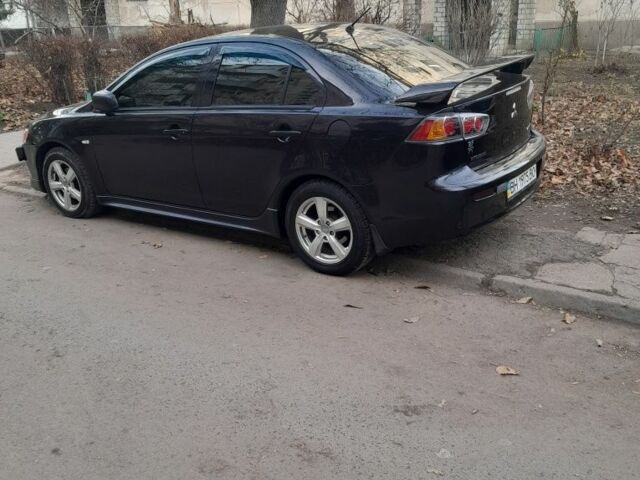 Черный Мицубиси АСХ, объемом двигателя 2 л и пробегом 210 тыс. км за 7500 $, фото 6 на Automoto.ua