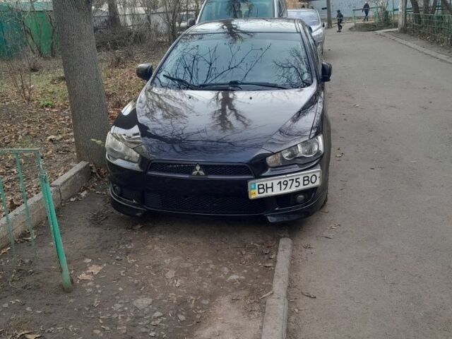 Черный Мицубиси АСХ, объемом двигателя 2 л и пробегом 210 тыс. км за 7500 $, фото 5 на Automoto.ua