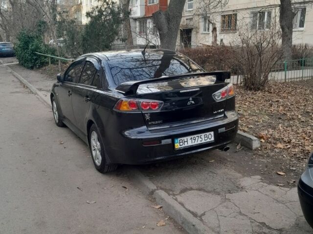 Черный Мицубиси АСХ, объемом двигателя 2 л и пробегом 210 тыс. км за 7500 $, фото 7 на Automoto.ua