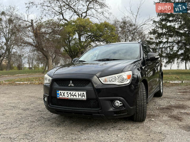 Черный Мицубиси АСХ, объемом двигателя 1.8 л и пробегом 150 тыс. км за 7800 $, фото 2 на Automoto.ua