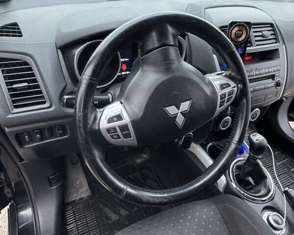 Черный Мицубиси АСХ, объемом двигателя 1.8 л и пробегом 265 тыс. км за 8900 $, фото 6 на Automoto.ua