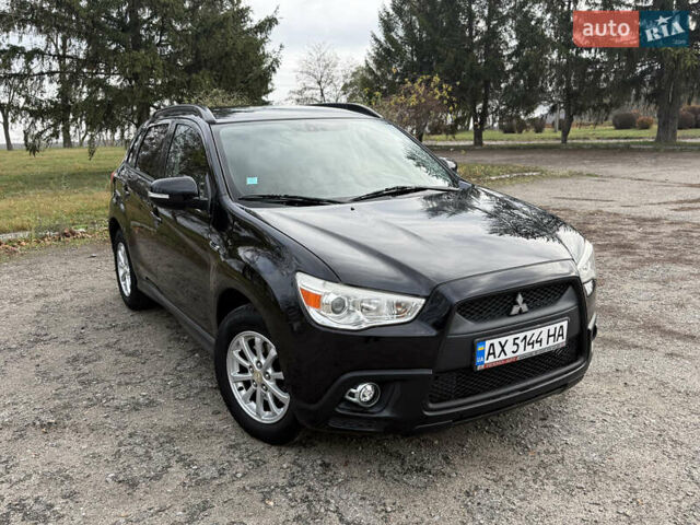 Черный Мицубиси АСХ, объемом двигателя 1.8 л и пробегом 150 тыс. км за 7800 $, фото 5 на Automoto.ua