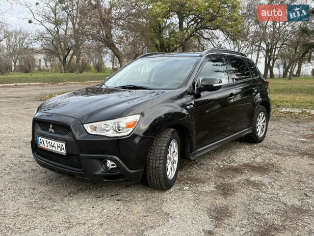 Черный Мицубиси АСХ, объемом двигателя 1.8 л и пробегом 150 тыс. км за 7800 $, фото 1 на Automoto.ua