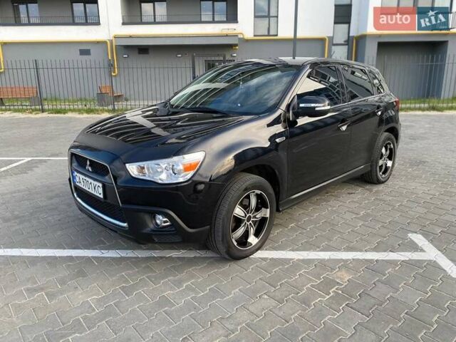 Черный Мицубиси АСХ, объемом двигателя 1.8 л и пробегом 283 тыс. км за 10500 $, фото 8 на Automoto.ua