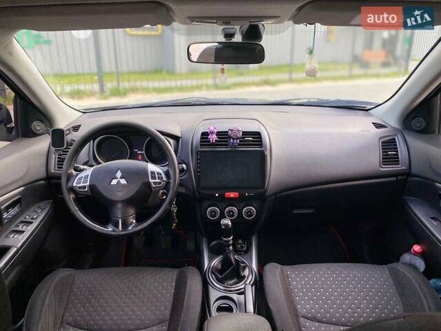 Черный Мицубиси АСХ, объемом двигателя 1.8 л и пробегом 283 тыс. км за 10500 $, фото 19 на Automoto.ua