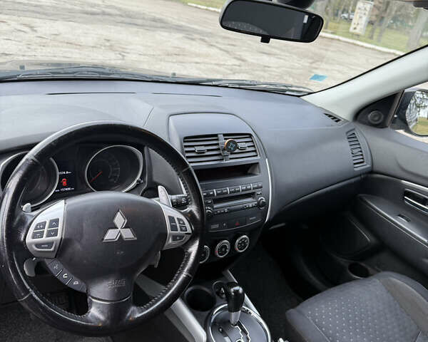 Черный Мицубиси АСХ, объемом двигателя 1.8 л и пробегом 150 тыс. км за 7800 $, фото 17 на Automoto.ua