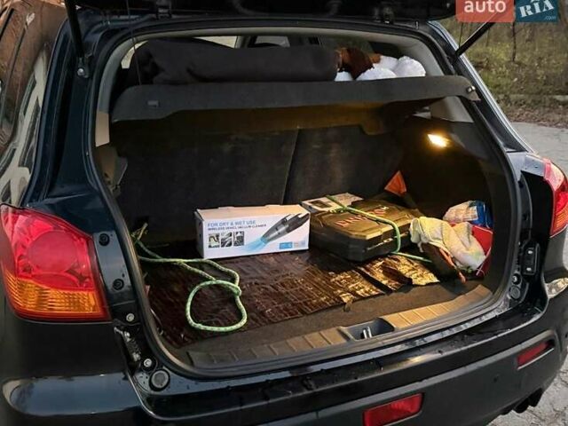 Черный Мицубиси АСХ, объемом двигателя 1.59 л и пробегом 203 тыс. км за 9600 $, фото 10 на Automoto.ua