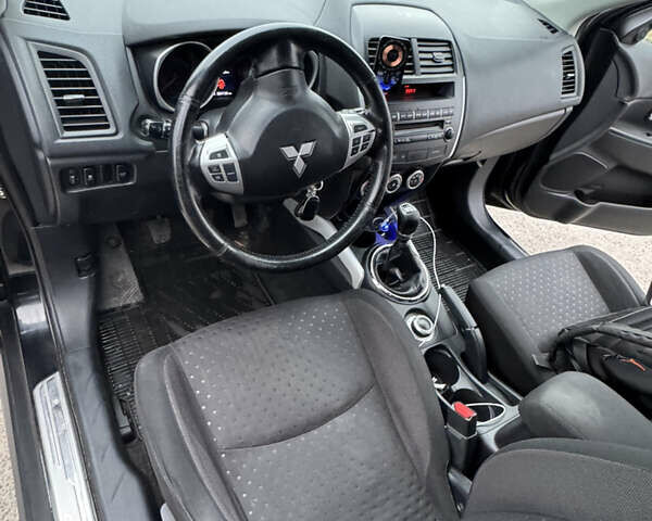 Черный Мицубиси АСХ, объемом двигателя 1.8 л и пробегом 265 тыс. км за 8900 $, фото 9 на Automoto.ua