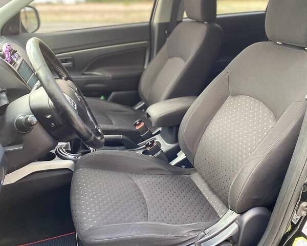 Черный Мицубиси АСХ, объемом двигателя 1.8 л и пробегом 283 тыс. км за 10500 $, фото 17 на Automoto.ua