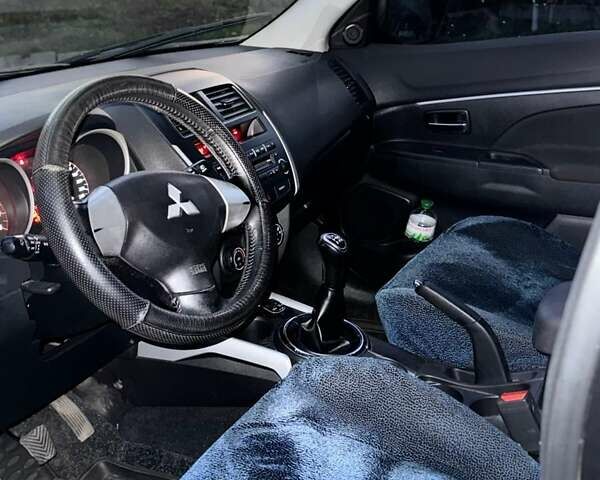 Черный Мицубиси АСХ, объемом двигателя 1.59 л и пробегом 203 тыс. км за 9600 $, фото 1 на Automoto.ua