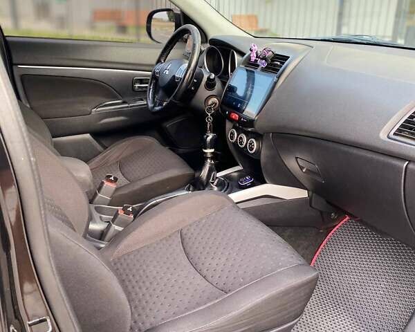 Черный Мицубиси АСХ, объемом двигателя 1.8 л и пробегом 283 тыс. км за 10500 $, фото 21 на Automoto.ua