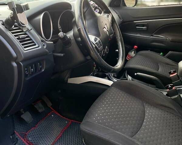 Черный Мицубиси АСХ, объемом двигателя 1.8 л и пробегом 283 тыс. км за 10500 $, фото 18 на Automoto.ua