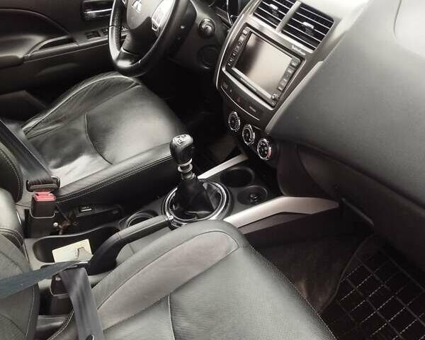 Черный Мицубиси АСХ, объемом двигателя 1.8 л и пробегом 246 тыс. км за 10500 $, фото 12 на Automoto.ua