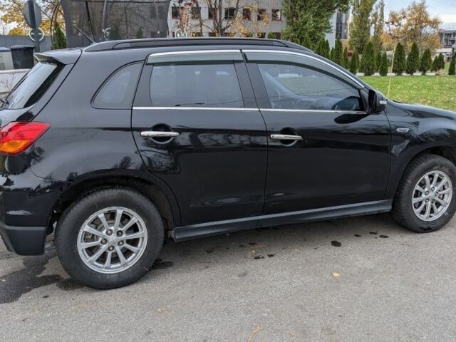 Черный Мицубиси АСХ, объемом двигателя 1.8 л и пробегом 140 тыс. км за 11200 $, фото 7 на Automoto.ua