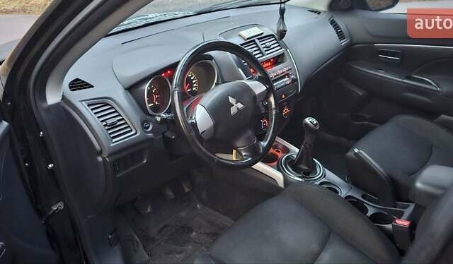 Черный Мицубиси АСХ, объемом двигателя 1.59 л и пробегом 226 тыс. км за 8700 $, фото 7 на Automoto.ua