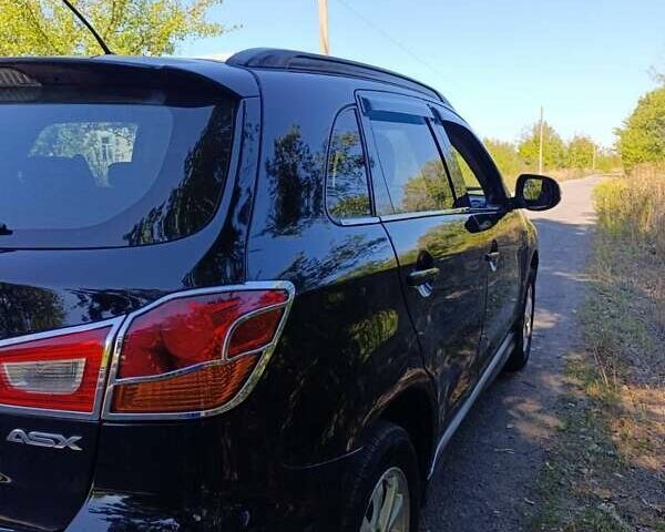 Чорний Міцубісі АСХ, об'ємом двигуна 1.8 л та пробігом 176 тис. км за 9500 $, фото 2 на Automoto.ua