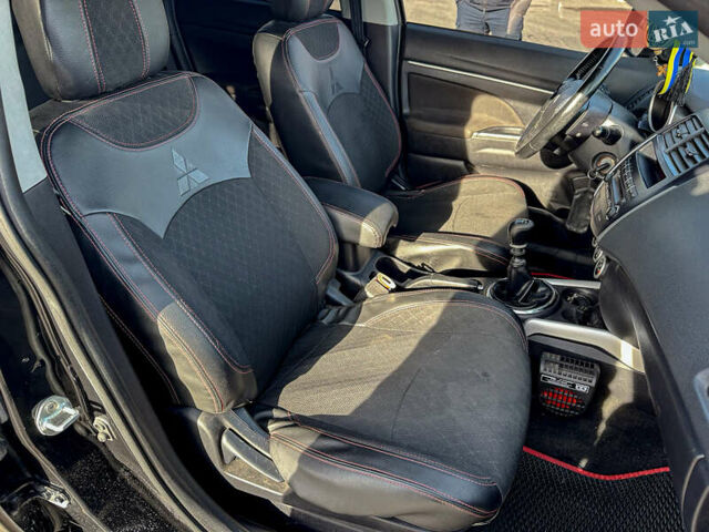 Черный Мицубиси АСХ, объемом двигателя 1.8 л и пробегом 253 тыс. км за 8200 $, фото 83 на Automoto.ua