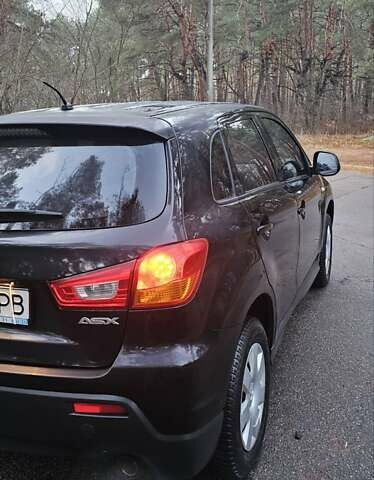 Черный Мицубиси АСХ, объемом двигателя 1.59 л и пробегом 226 тыс. км за 8700 $, фото 5 на Automoto.ua