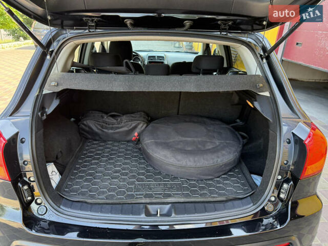 Чорний Міцубісі АСХ, об'ємом двигуна 1.8 л та пробігом 219 тис. км за 12400 $, фото 14 на Automoto.ua