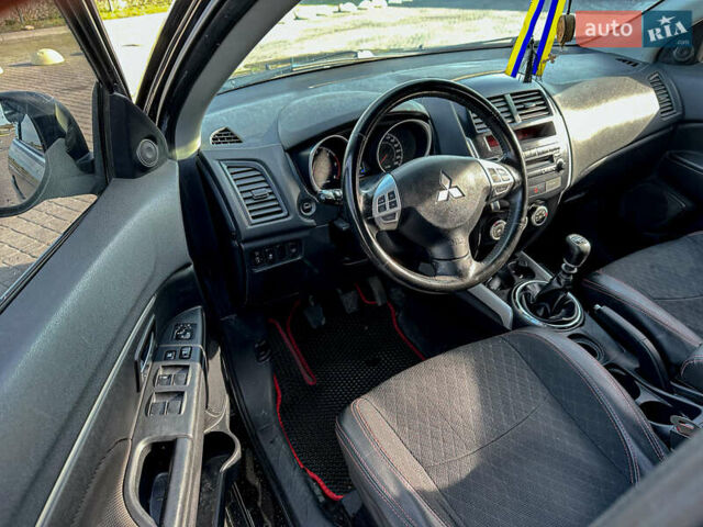 Черный Мицубиси АСХ, объемом двигателя 1.8 л и пробегом 253 тыс. км за 8200 $, фото 52 на Automoto.ua