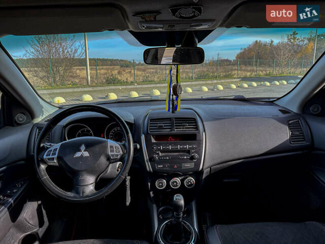 Черный Мицубиси АСХ, объемом двигателя 1.8 л и пробегом 253 тыс. км за 8200 $, фото 73 на Automoto.ua