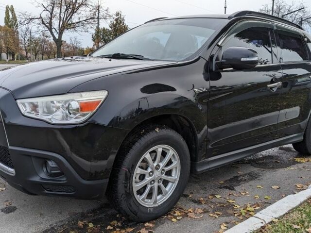 Черный Мицубиси АСХ, объемом двигателя 1.8 л и пробегом 140 тыс. км за 11200 $, фото 4 на Automoto.ua