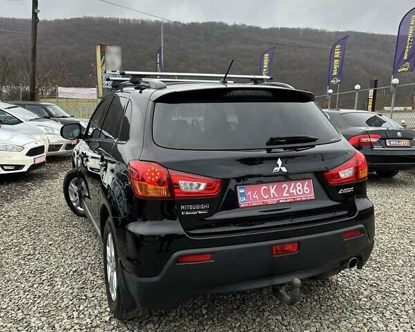 Черный Мицубиси АСХ, объемом двигателя 1.8 л и пробегом 226 тыс. км за 9950 $, фото 21 на Automoto.ua