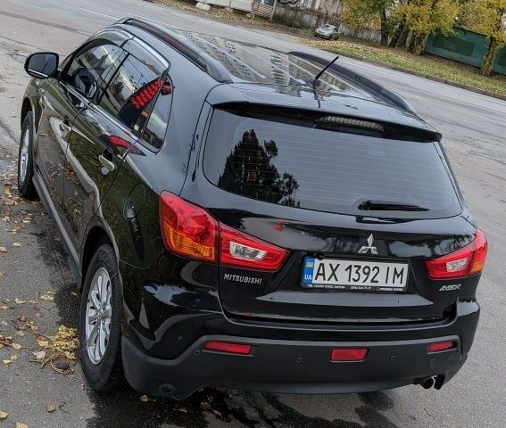 Черный Мицубиси АСХ, объемом двигателя 1.8 л и пробегом 140 тыс. км за 11200 $, фото 2 на Automoto.ua