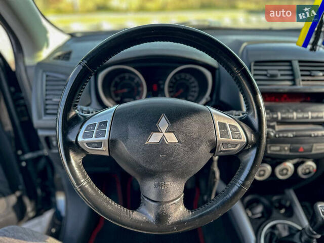 Черный Мицубиси АСХ, объемом двигателя 1.8 л и пробегом 253 тыс. км за 8200 $, фото 61 на Automoto.ua