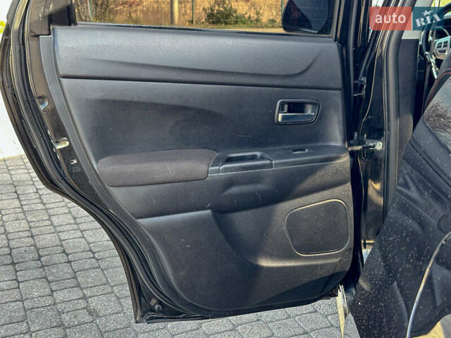 Черный Мицубиси АСХ, объемом двигателя 1.8 л и пробегом 253 тыс. км за 8200 $, фото 69 на Automoto.ua