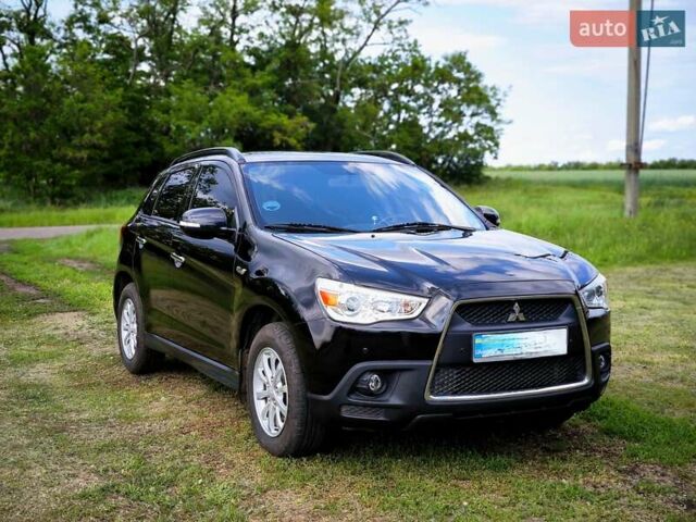 Чорний Міцубісі АСХ, об'ємом двигуна 1.8 л та пробігом 161 тис. км за 10800 $, фото 3 на Automoto.ua