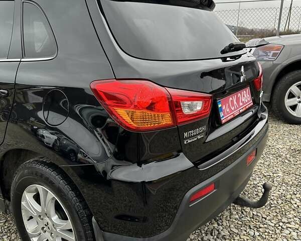 Черный Мицубиси АСХ, объемом двигателя 1.8 л и пробегом 226 тыс. км за 9950 $, фото 6 на Automoto.ua