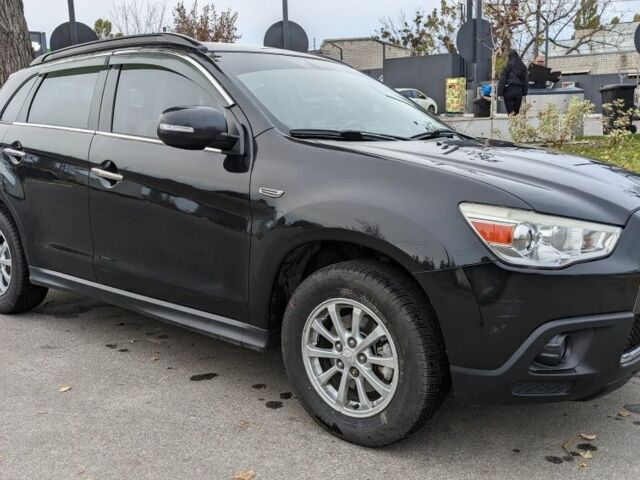 Черный Мицубиси АСХ, объемом двигателя 1.8 л и пробегом 140 тыс. км за 11200 $, фото 3 на Automoto.ua