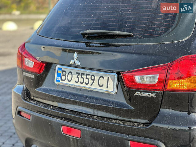 Черный Мицубиси АСХ, объемом двигателя 1.8 л и пробегом 253 тыс. км за 8200 $, фото 46 на Automoto.ua