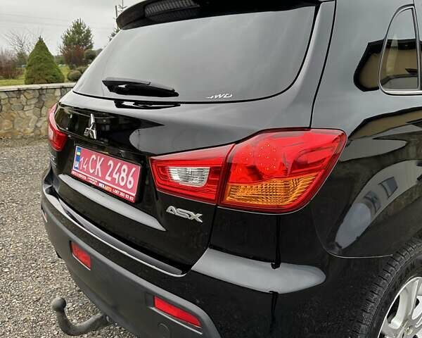 Черный Мицубиси АСХ, объемом двигателя 1.8 л и пробегом 226 тыс. км за 9950 $, фото 29 на Automoto.ua