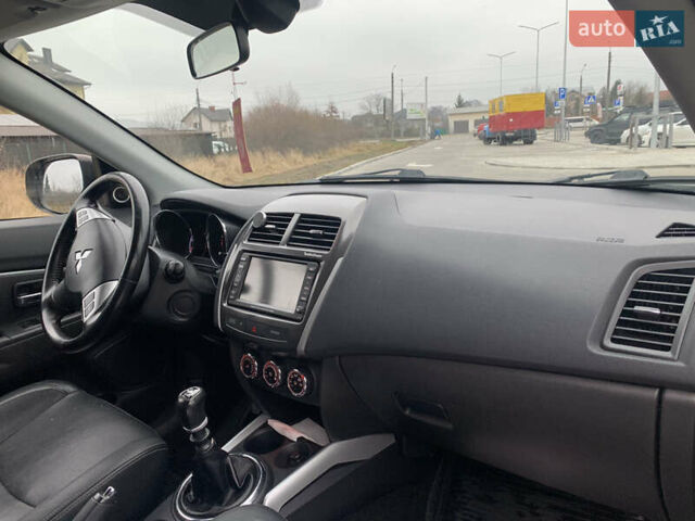 Черный Мицубиси АСХ, объемом двигателя 1.8 л и пробегом 223 тыс. км за 10800 $, фото 15 на Automoto.ua