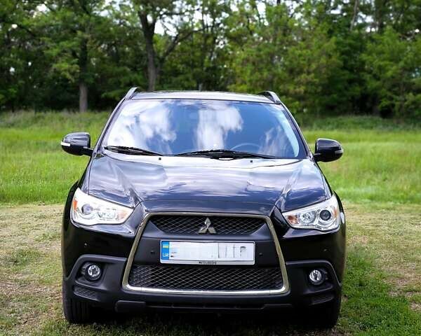 Чорний Міцубісі АСХ, об'ємом двигуна 1.8 л та пробігом 161 тис. км за 10800 $, фото 2 на Automoto.ua
